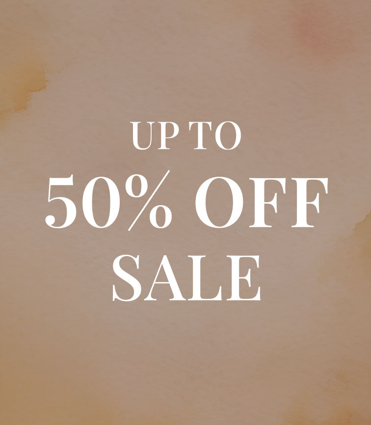 Text on a beige watercolor background promoting a sale.