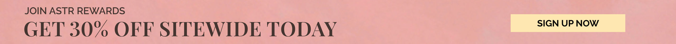 Pink shirt with long sleeves and a loose fit.