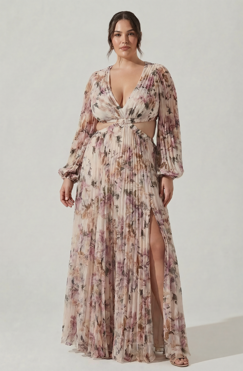 Flowy floral maxi dress with cut-out waist and high slit, long puffed sleeves.