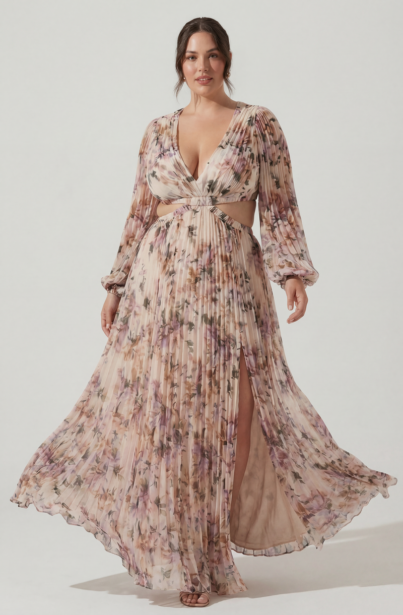 Long floral pleated dress with cut-out sides and a high slit.