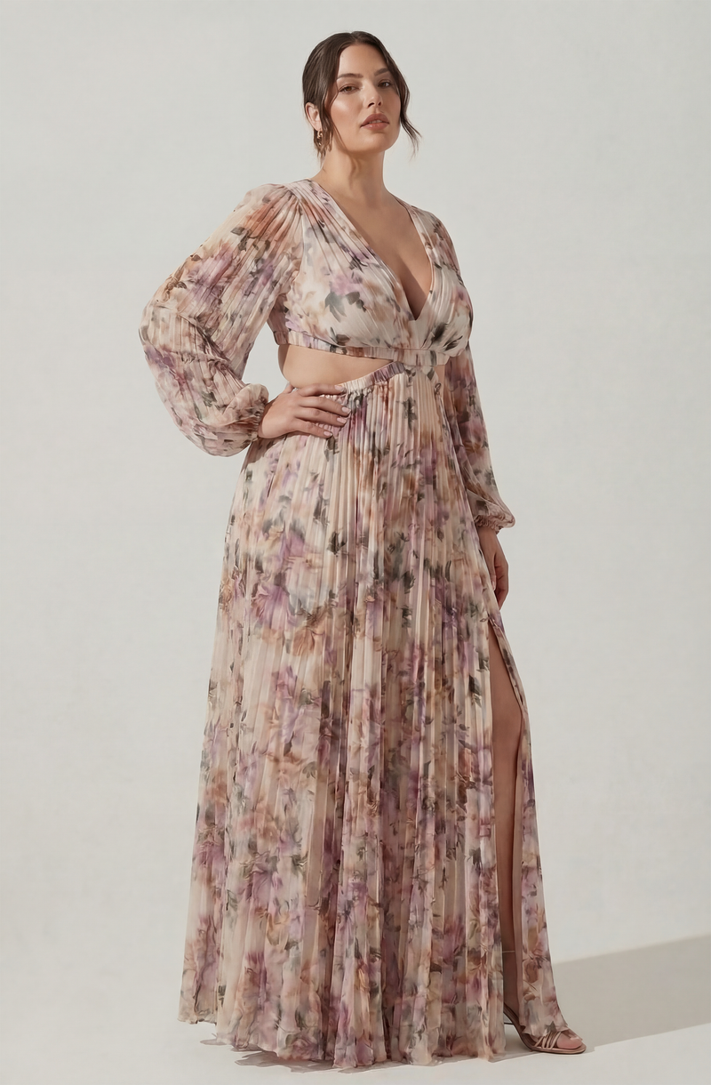 Flowy floral maxi dress with long sheer sleeves and a thigh-high slit.