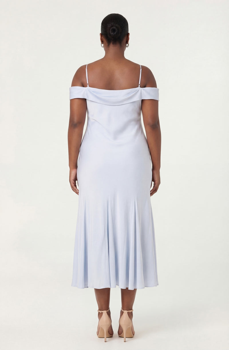 White off-the-shoulder dress with spaghetti straps and a pleated skirt.