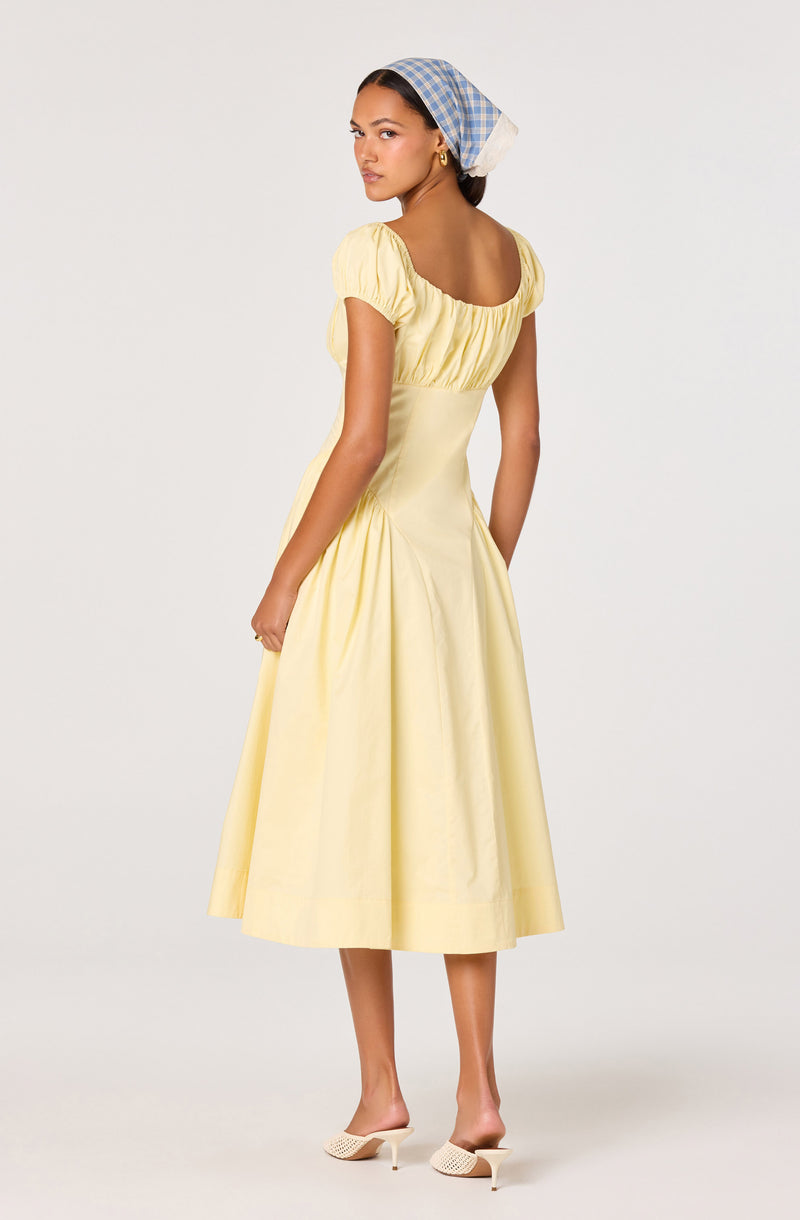 Light yellow, short-sleeve, midi-length dress with gathered neckline and full skirt.