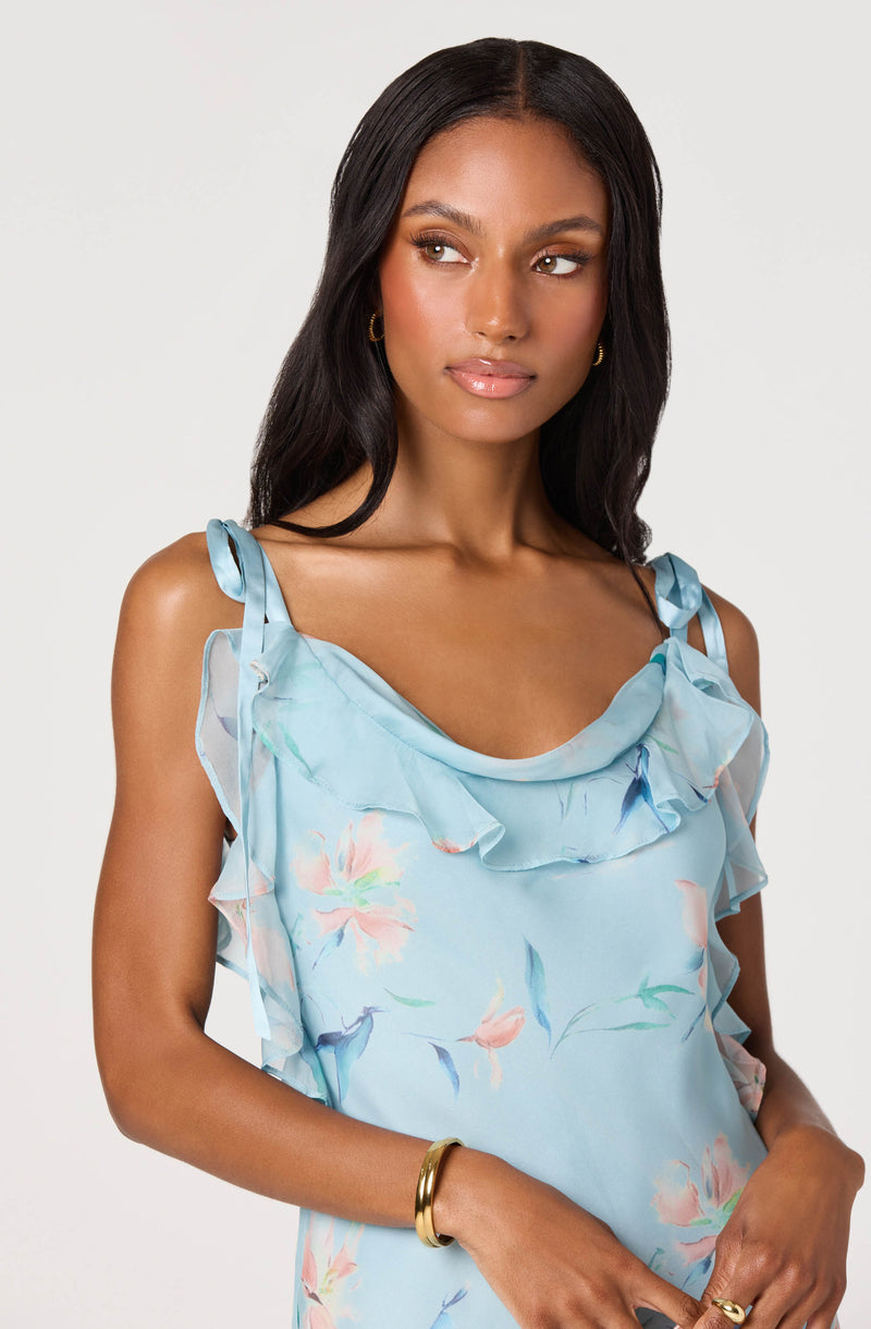 Light blue floral dress with ruffled straps and neckline.