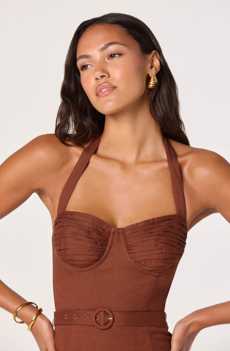 Brown halter top with pleated bust detail and matching high-waisted skirt with belt.