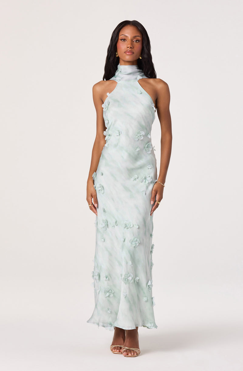 Maxi dress with a high neck, sleeveless design, and pastel tie-dye pattern.
