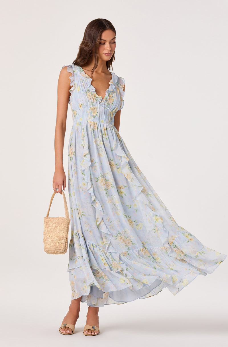 Light blue floral maxi dress with ruffle details and sleeveless design.