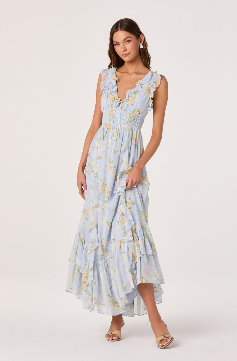Light blue floral ruffled maxi dress with sleeveless design and tiered hem.