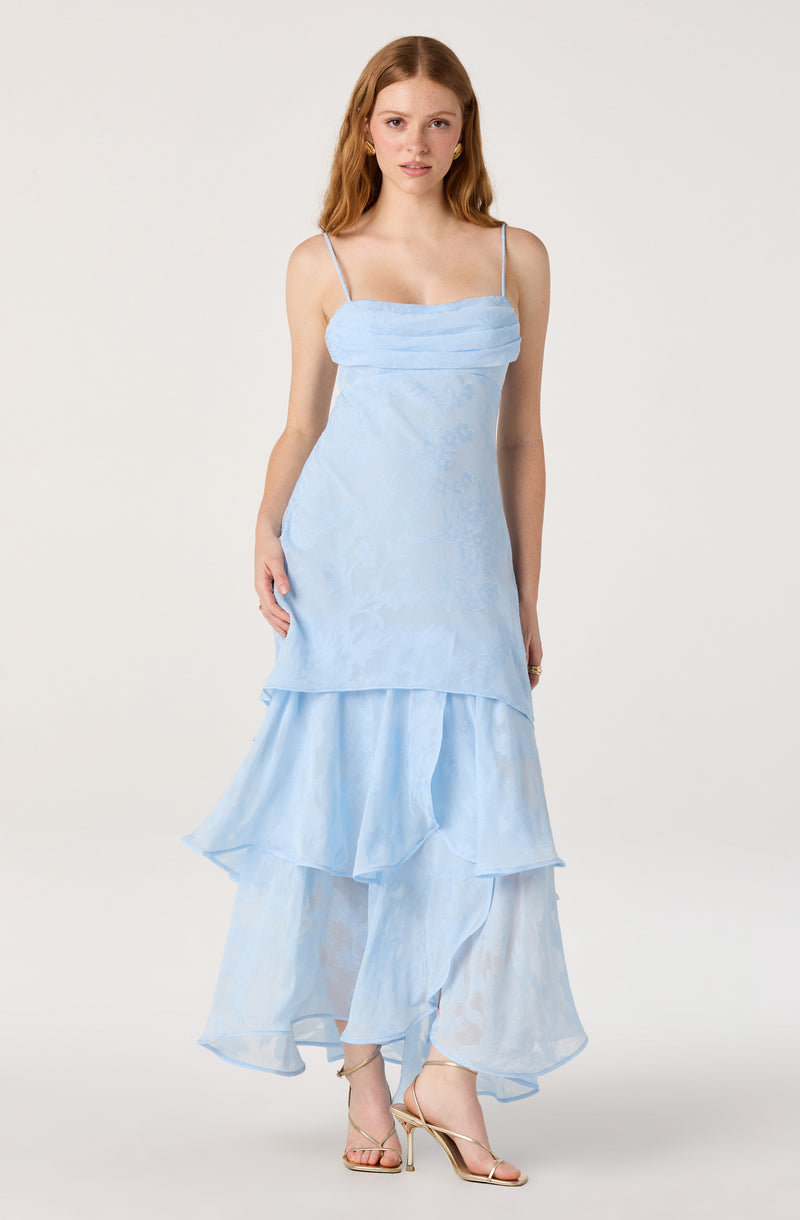Light blue spaghetti strap dress with tiered ruffle layers and asymmetrical hem.