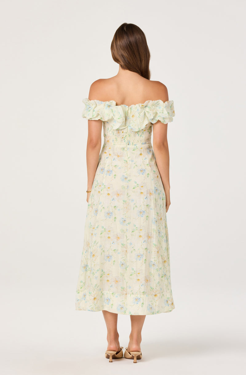 Off-shoulder beige dress with ruffled neckline and floral print.