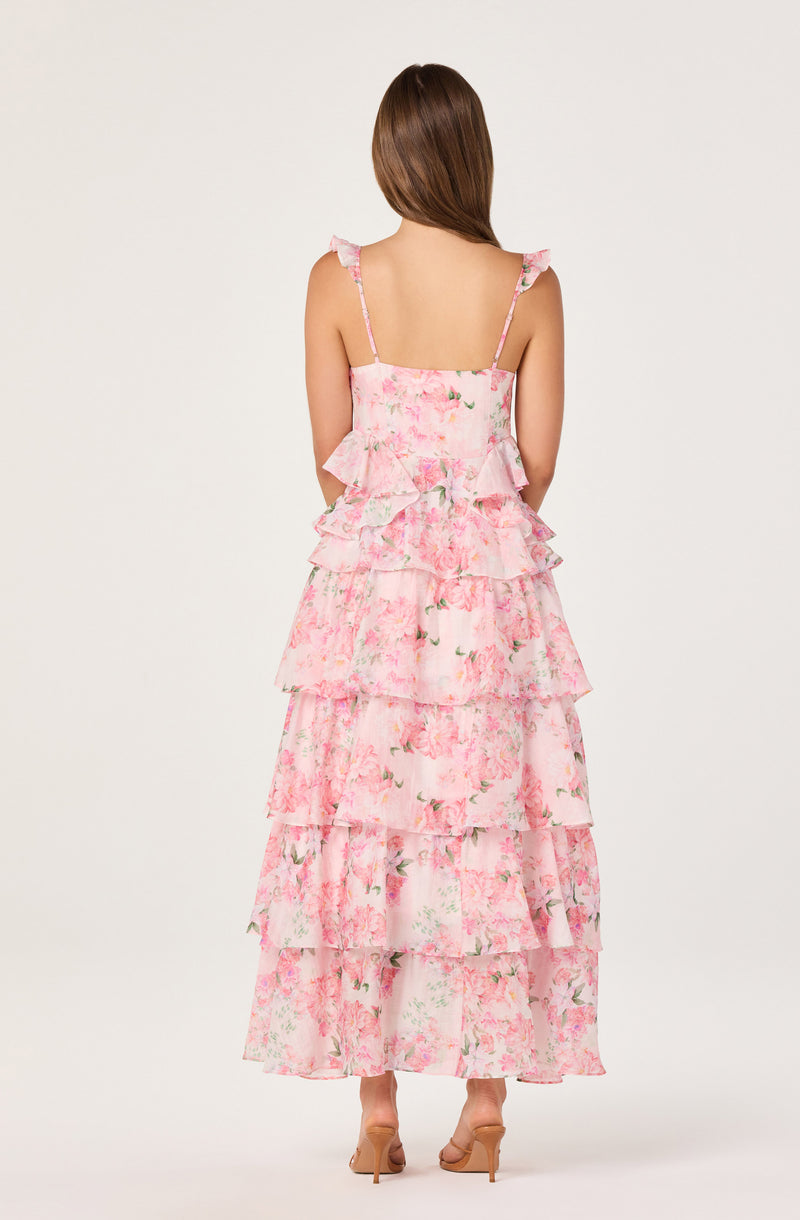 Pink floral tiered maxi dress with ruffled straps.