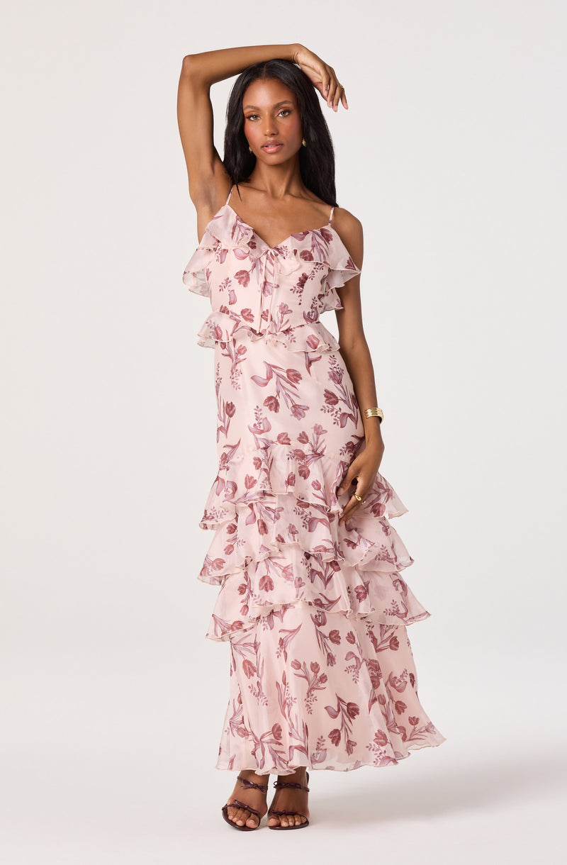 Pink floral ruffled maxi dress with thin shoulder straps.