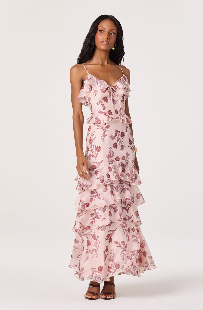 Pink floral dress with ruffled layers and spaghetti straps.