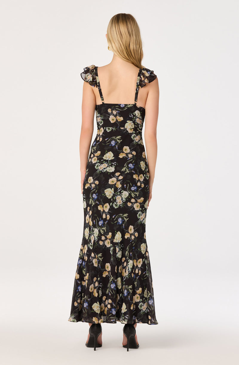 Maxi dress with ruffled shoulder straps, black floral pattern, and fitted waist.