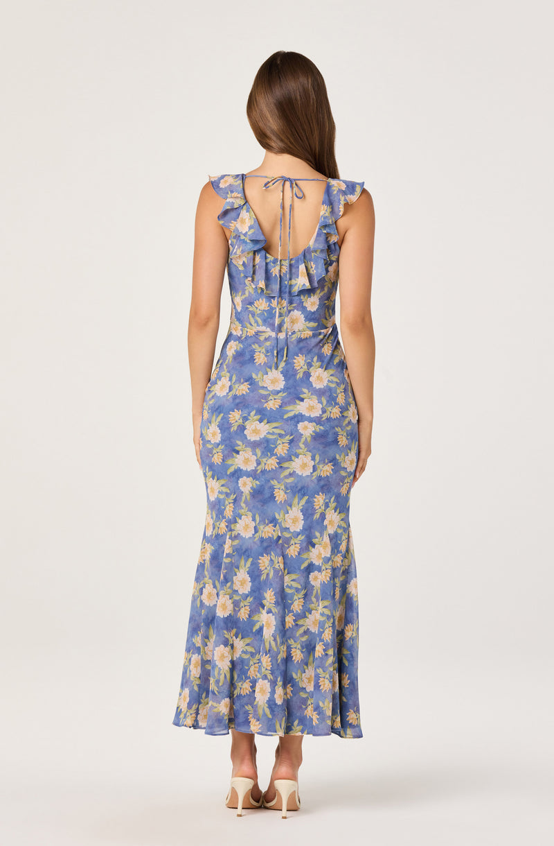 Long blue floral dress with ruffled shoulder details and a tie at the back.