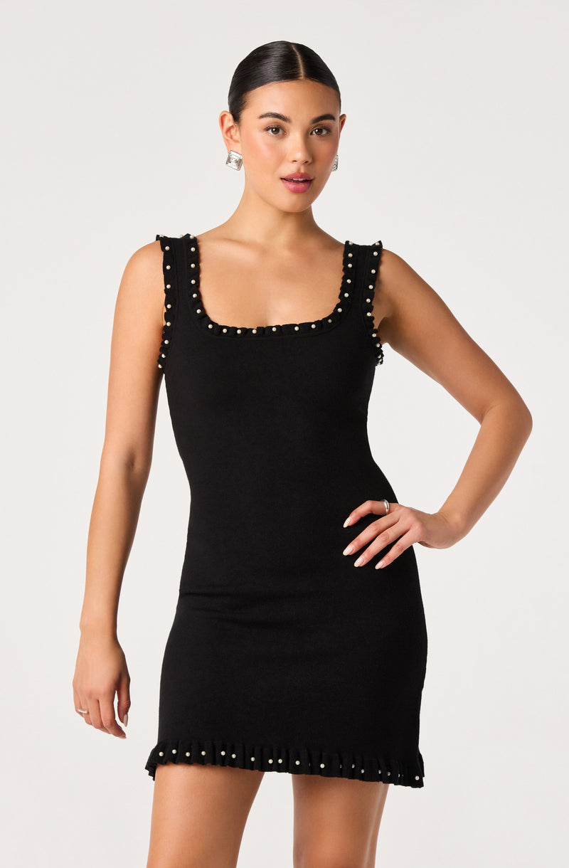 Black sleeveless dress with pearl details on the straps and hem.