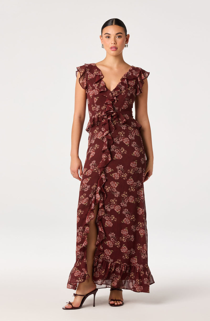Mariachi-inspired floral gown with ruffled shoulders and front slit.