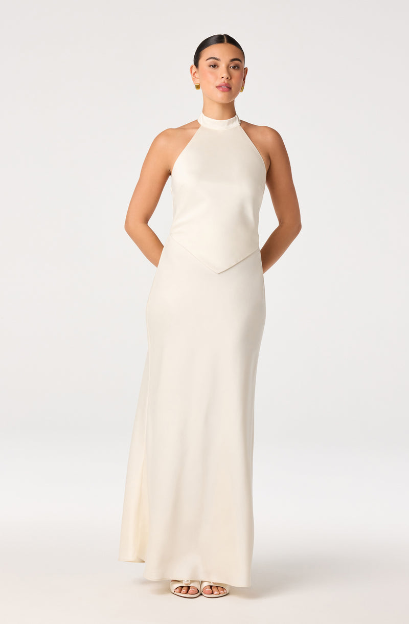 Elegant cream-colored sleeveless gown with a high neckline and fitted silhouette.
