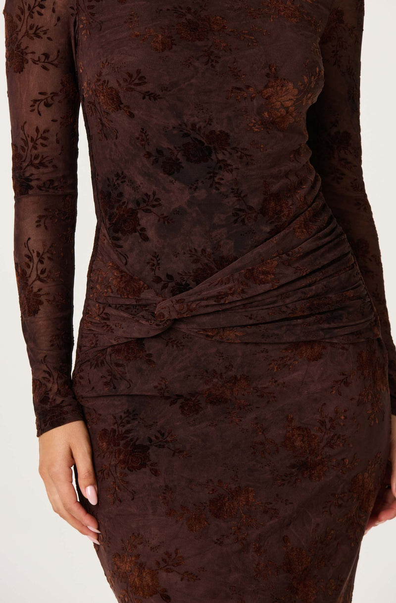 Brown floral velvet dress with long sleeves and ruched waist.