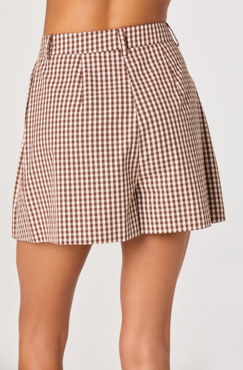 Brown and white checkered shorts with pleats and belt loops.