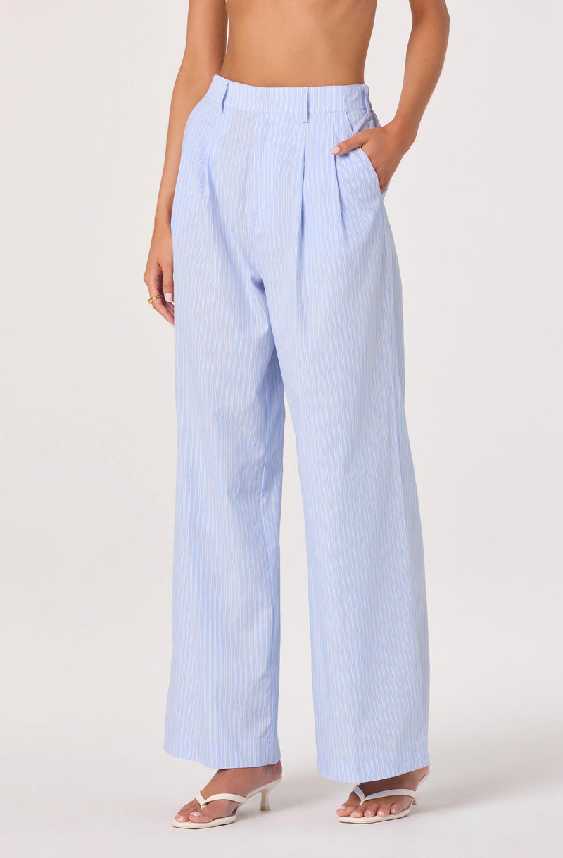 Light blue and white vertically striped wide-leg pants with a high waist and front pleats.