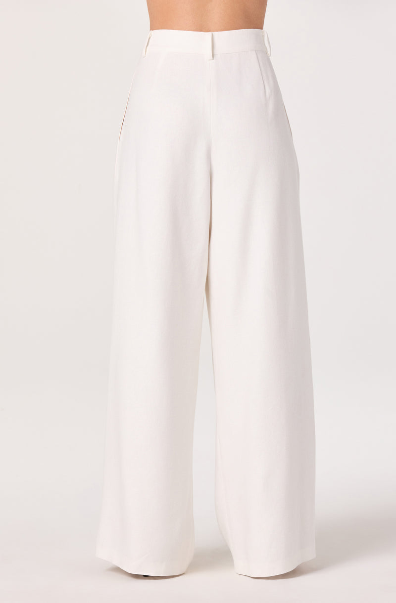 High-waisted white wide-leg trousers with a tailored fit.