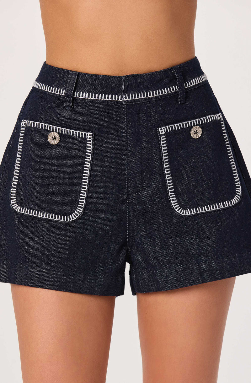 Dark denim shorts with white stitched pocket and waistband details.