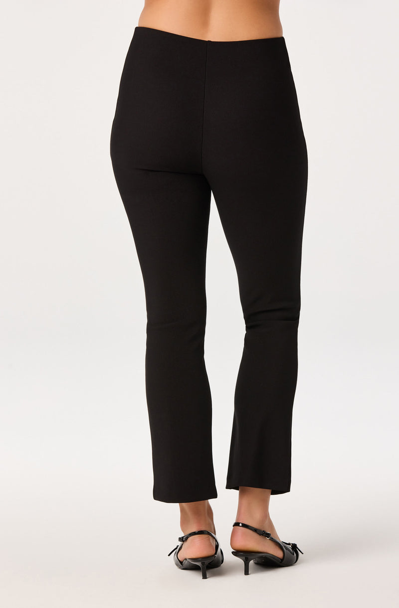Black straight-leg dress pants with a high waist.