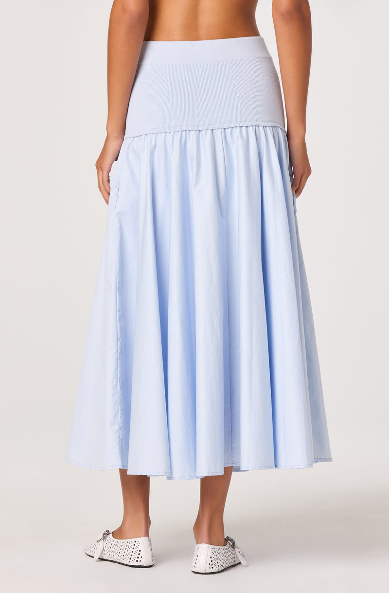 Light blue high-waisted skirt with gathered fabric and a wide waistband.