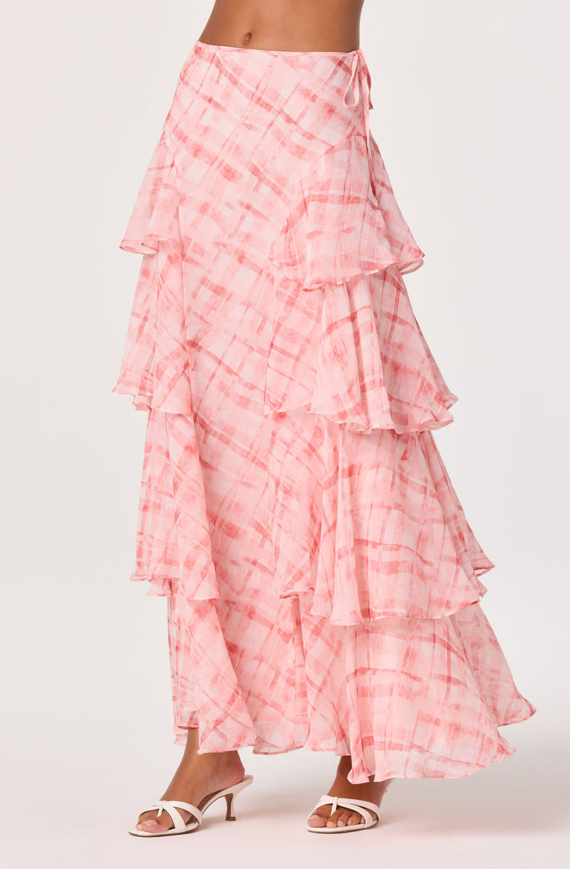 Pink and peach checkered tiered maxi skirt with ruffled layers and a side tie.