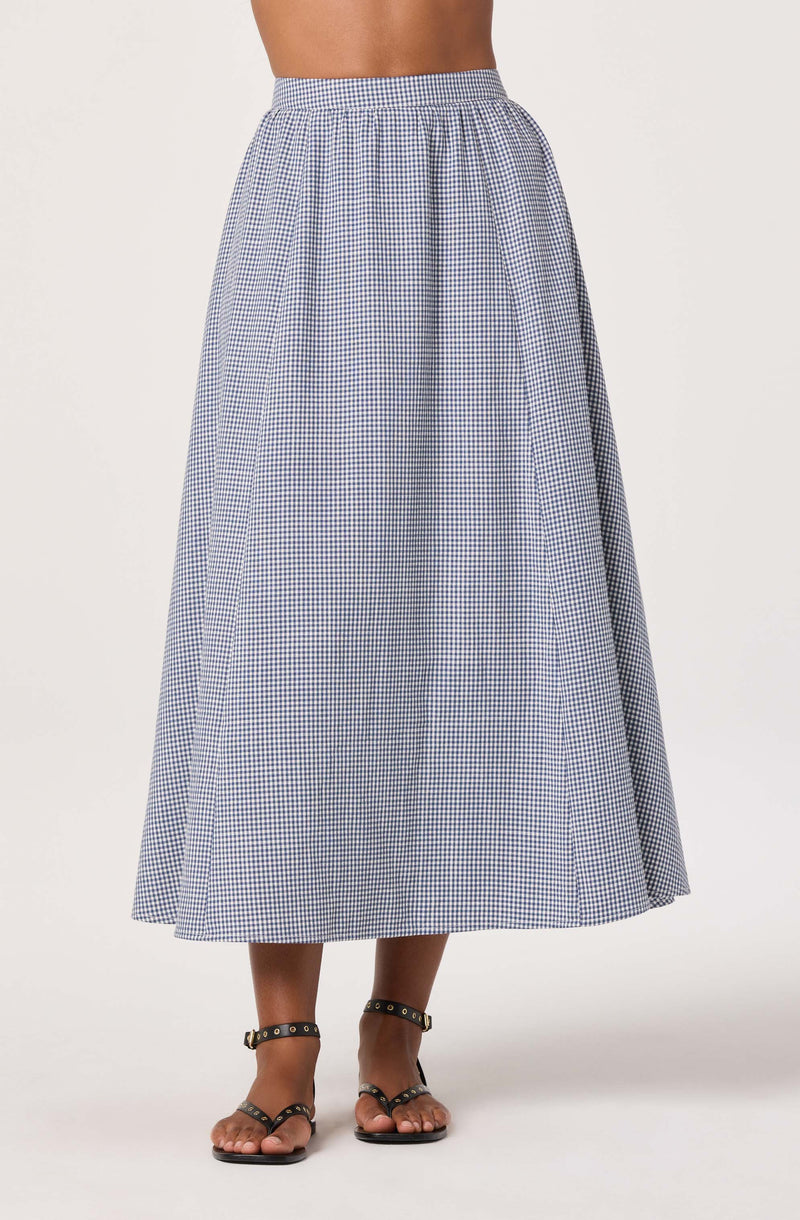 Blue and white checkered maxi skirt with an elastic waist, paired with black sandals.