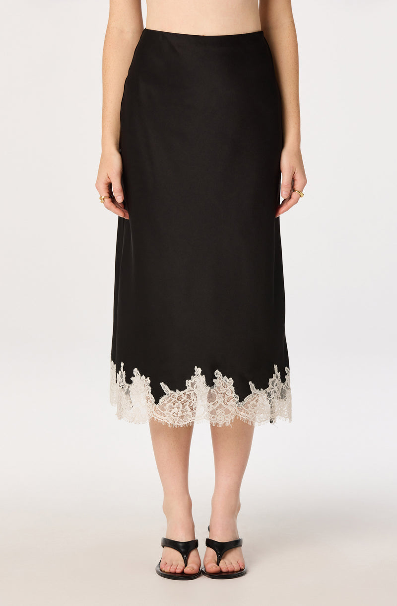 Black midi skirt with white lace hem.