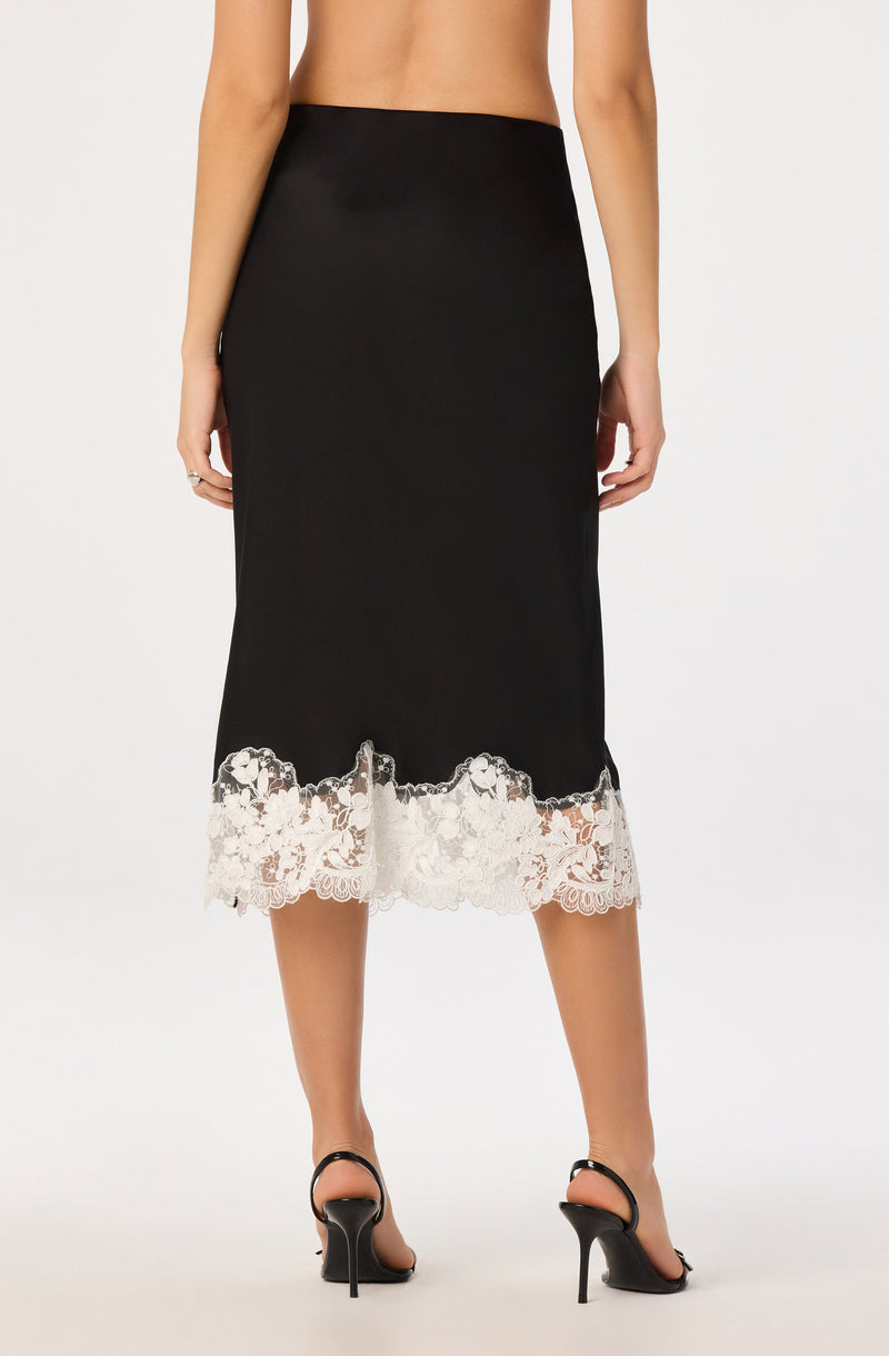 Black midi skirt with white lace hem.