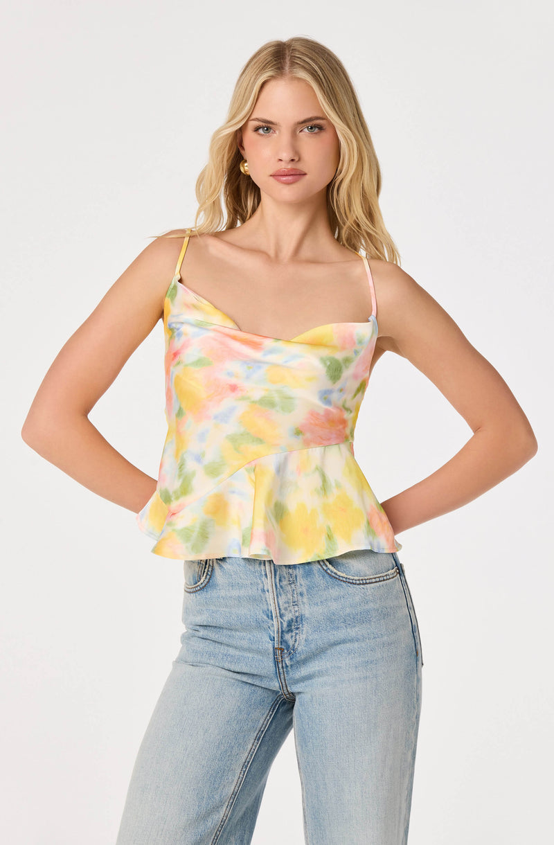 Tank top with a colorful tie-dye pattern and a ruffled hem.