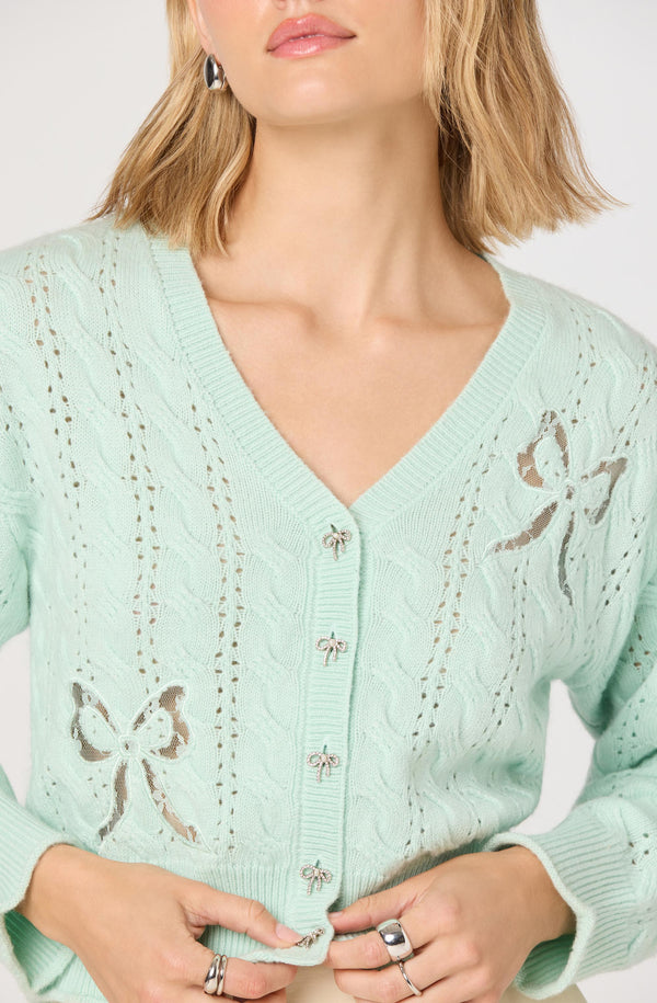 あやAerienne Cable-Knit Ribbon Cardigan Kalen Cable-Knit Bow Cutout Cardigan - ASTR the Label