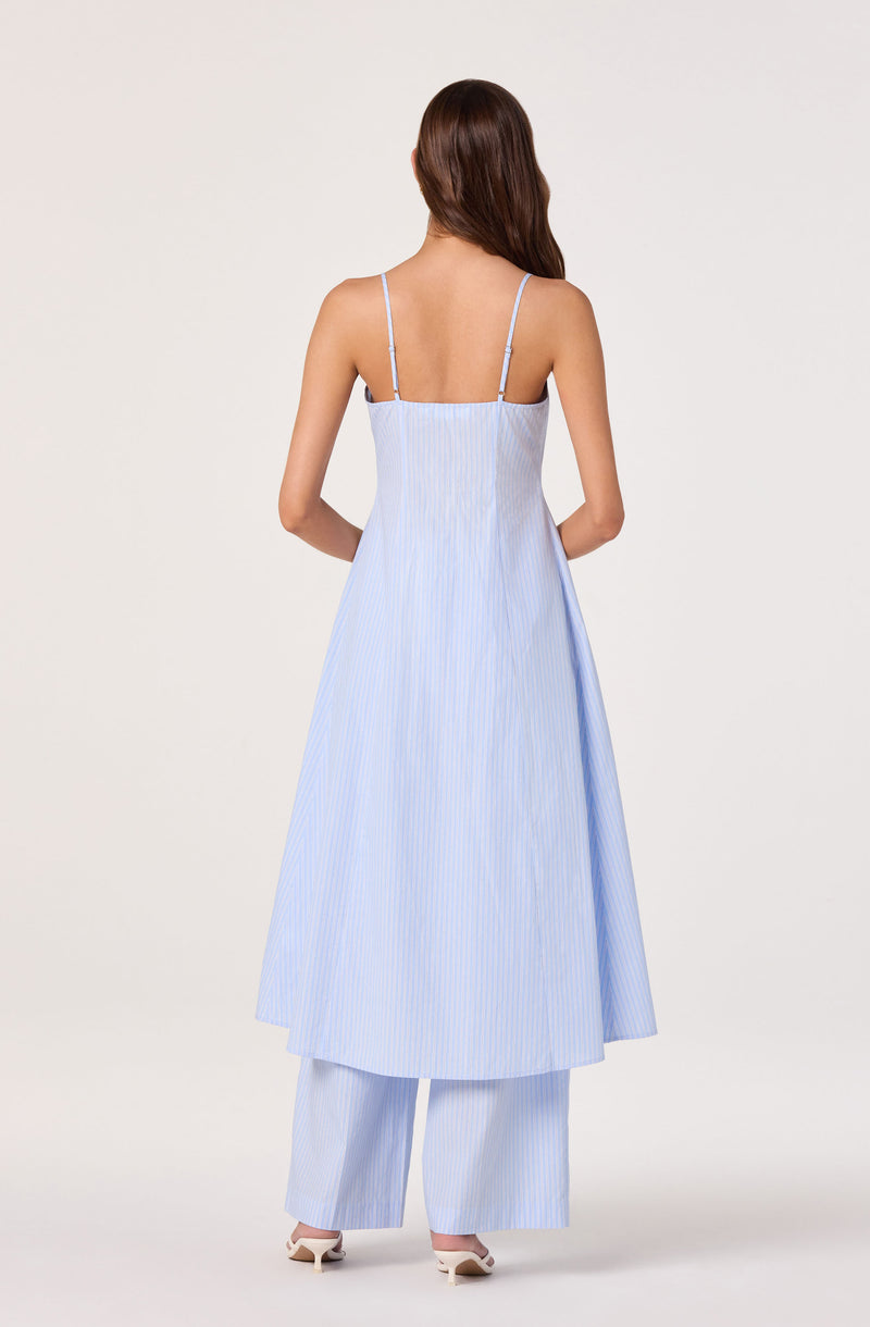 Light blue and white striped sleeveless dress with spaghetti straps over matching wide-leg pants.