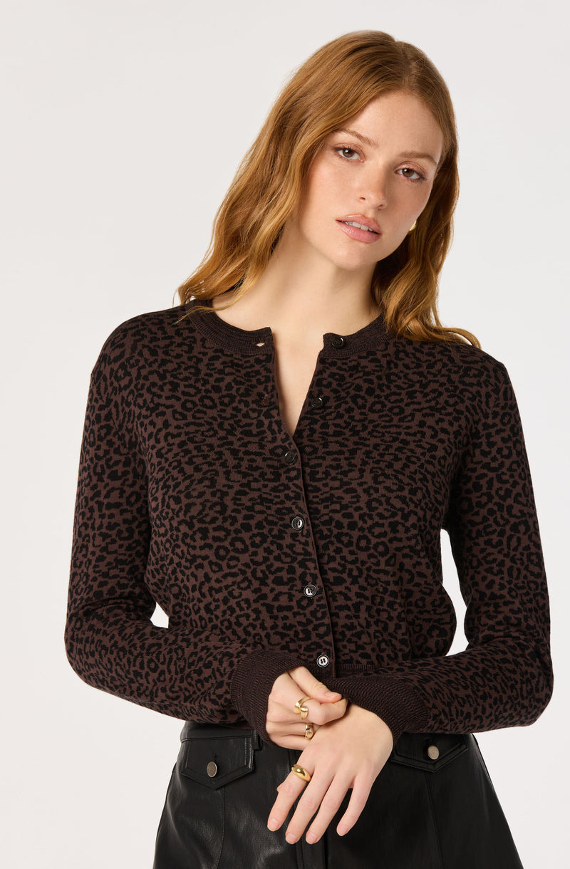 Black and brown leopard print cardigan with a round neckline and button-up front.