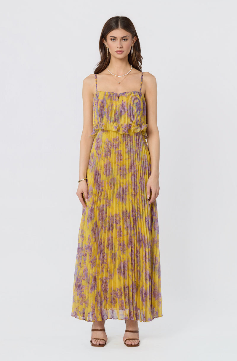 Yellow and purple floral strapless maxi dress with ruffled waist and pleated skirt.