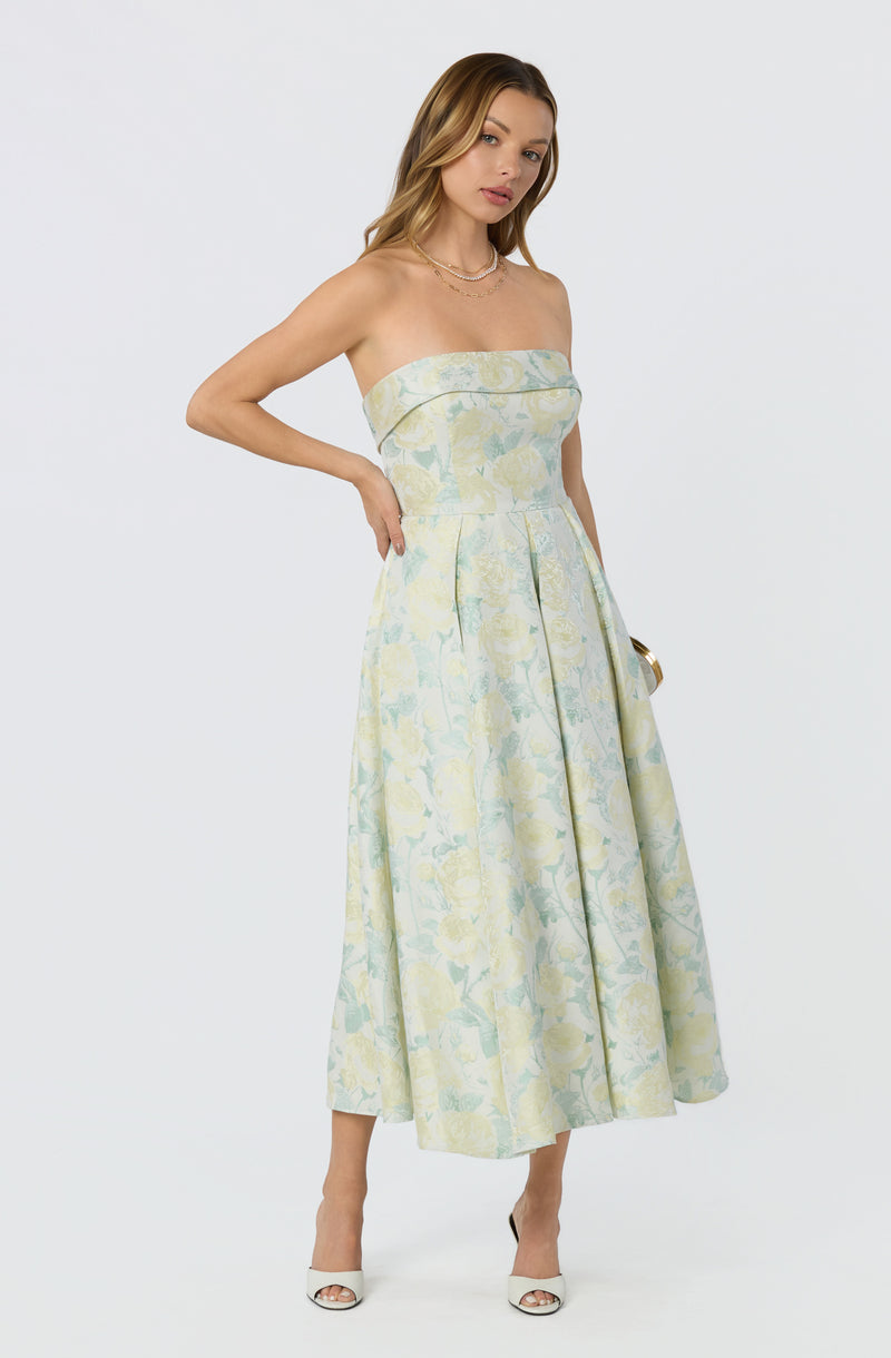 Strapless pastel floral dress with a fitted bodice and a full midi skirt.