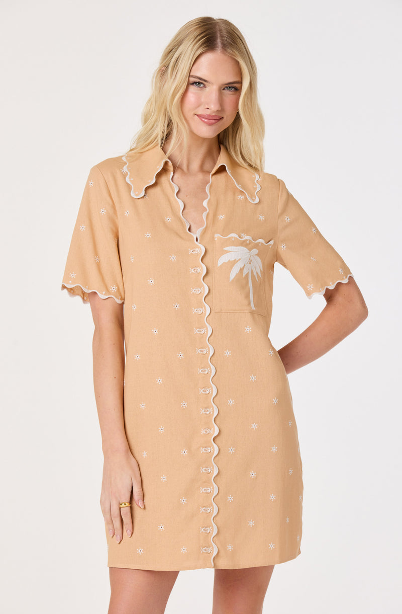 Beige short-sleeve dress with scalloped edges and white embroidered flowers, palm tree print.