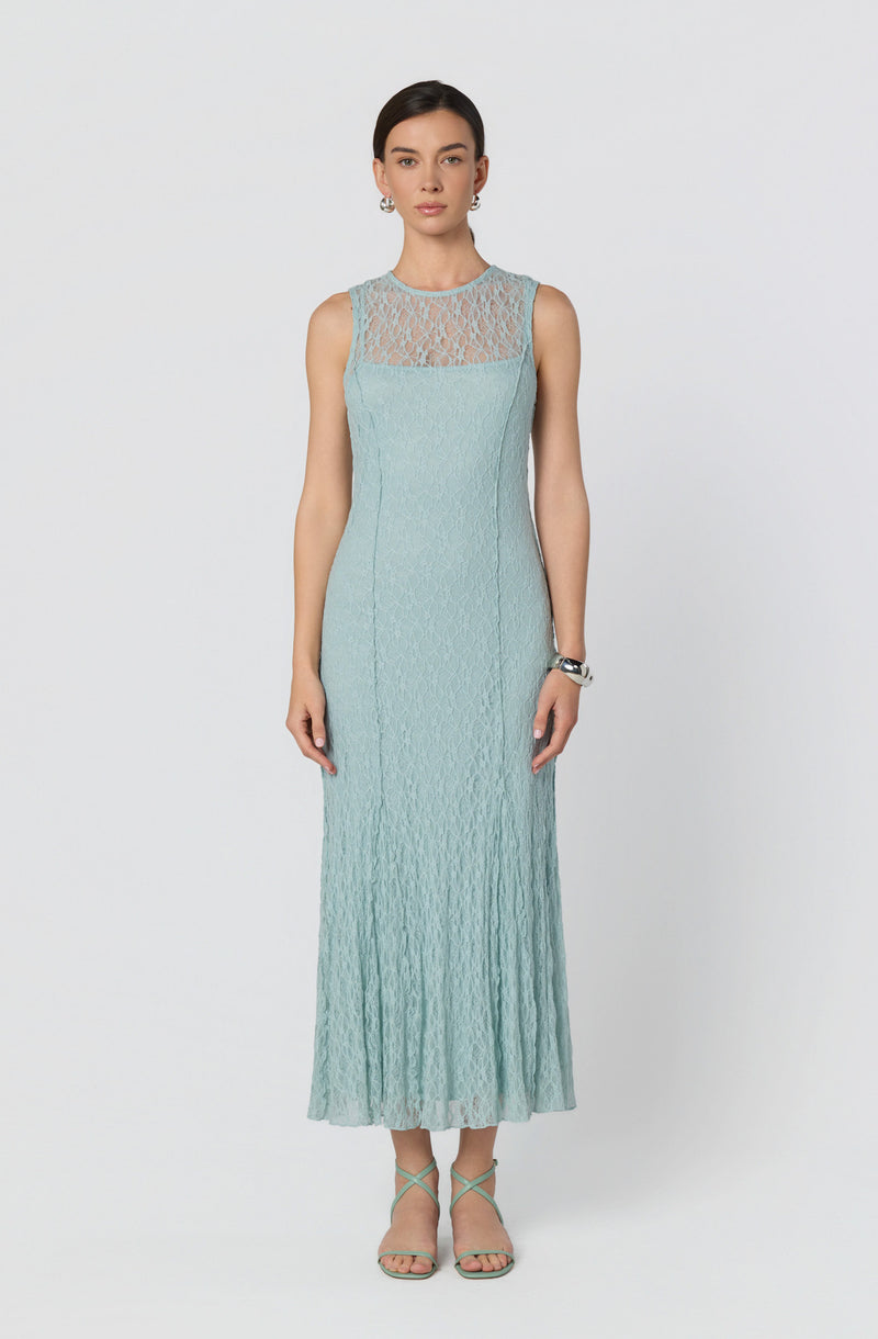 Long light blue dress with a lace overlay on the top and a pleated skirt.