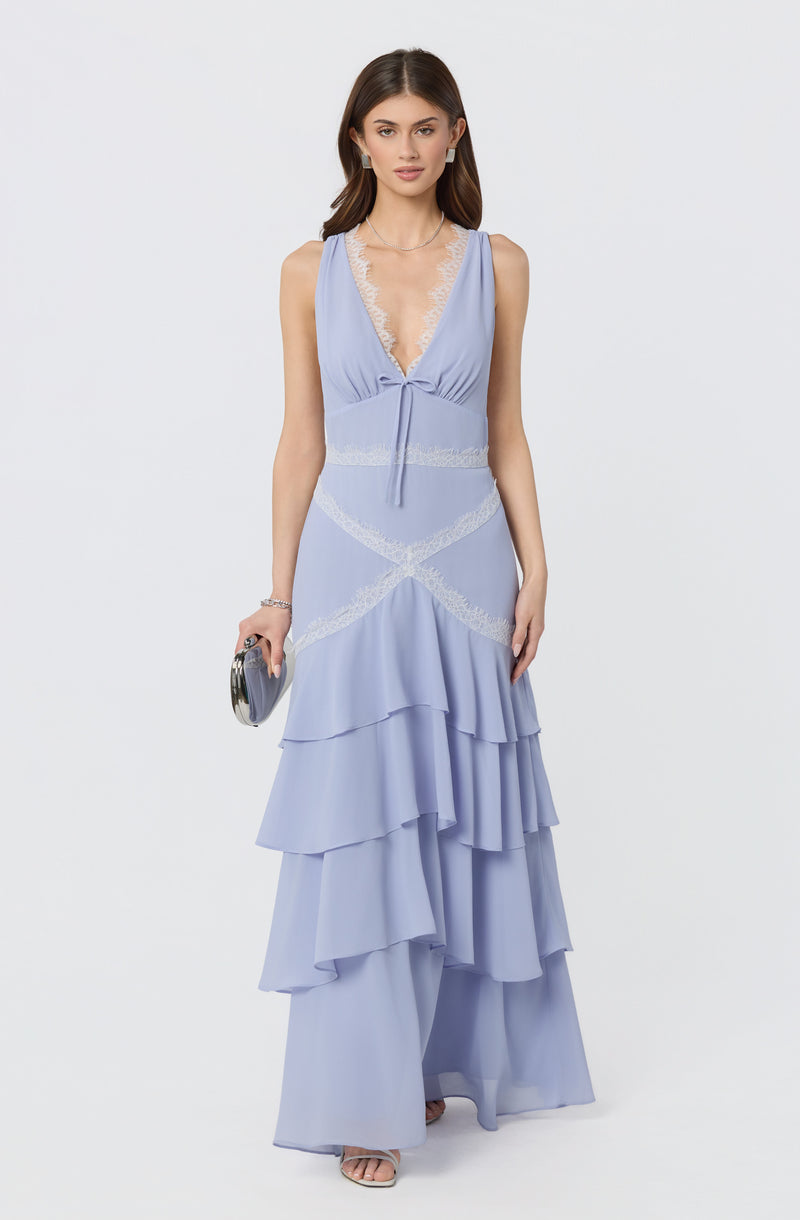 Women’s light blue sleeveless dress with lace details and tiered ruffled skirt.