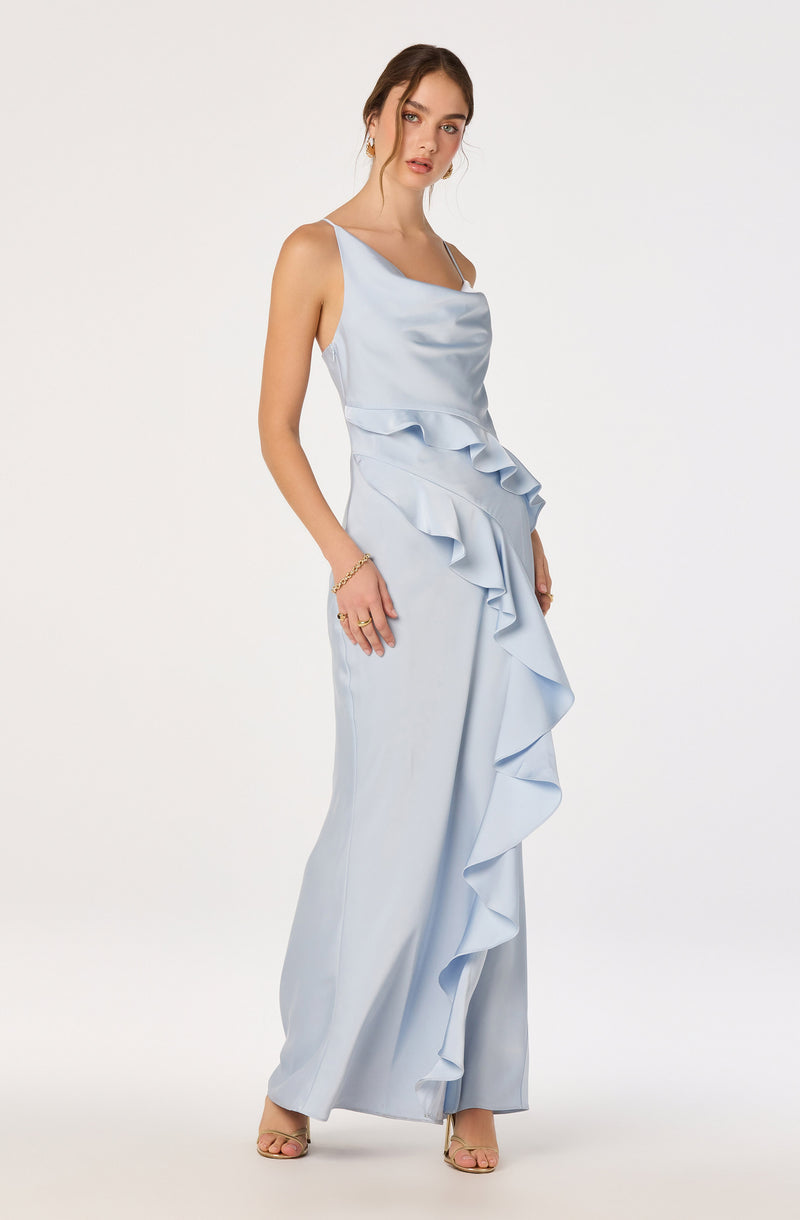 Light blue satin jumpsuit with ruffle details along the front and a sleeveless, square neckline.