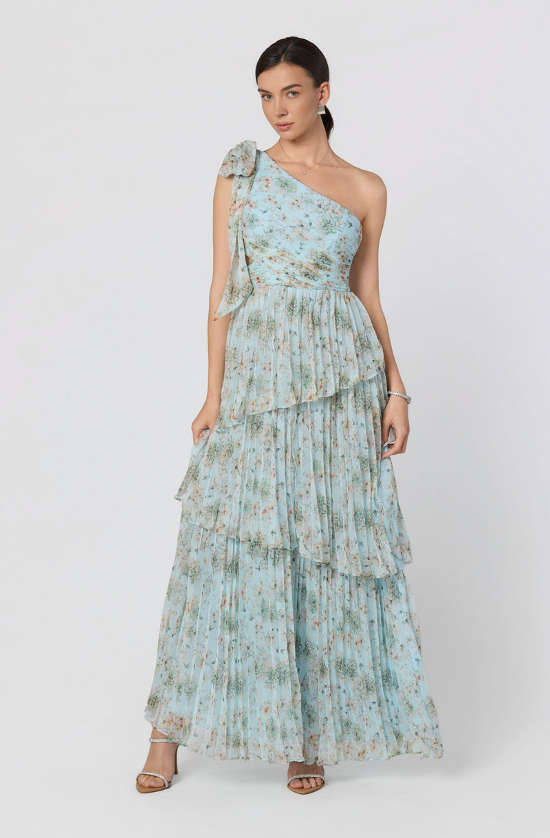 Light blue floral one-shoulder maxi dress with ruffles and pleats.