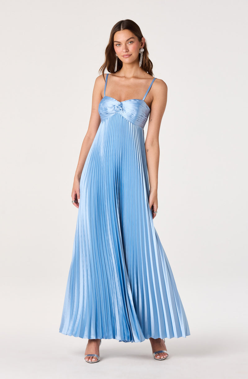 Blue pleated maxi dress with spaghetti straps and a ruched bodice.