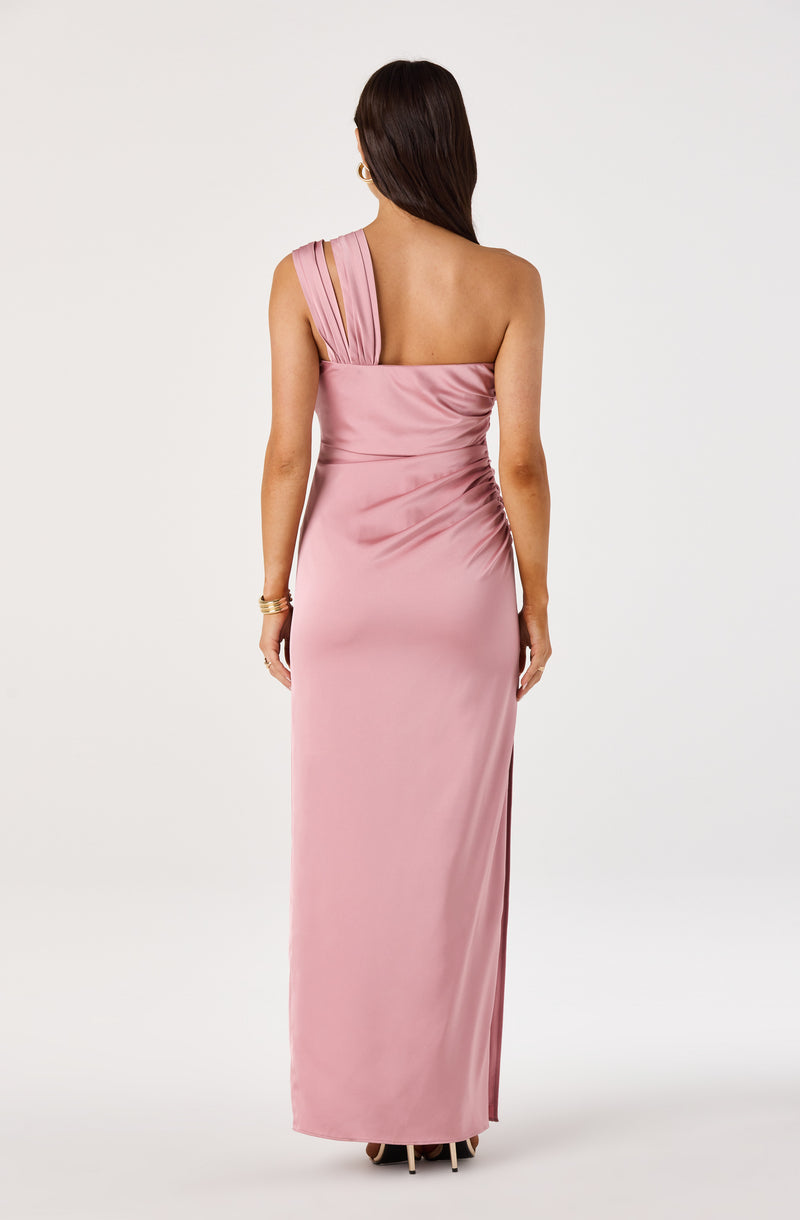 Woman in a pink satin, one-shoulder, floor-length dress with pleated detailing.