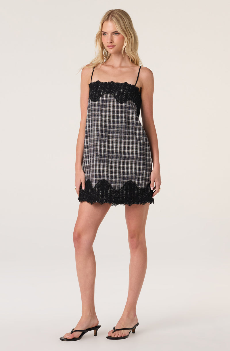 Black and white plaid slip dress with black lace trim and spaghetti straps.