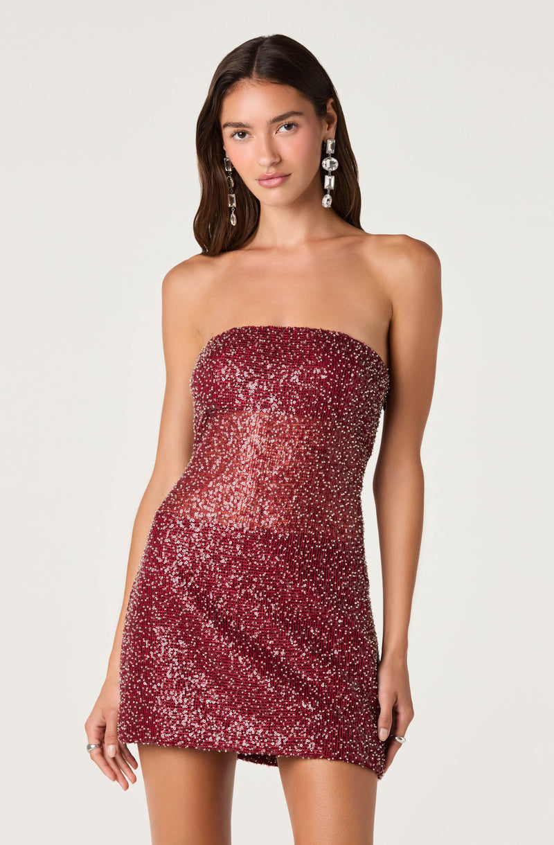 Red strapless dress covered in sparkling sequins.