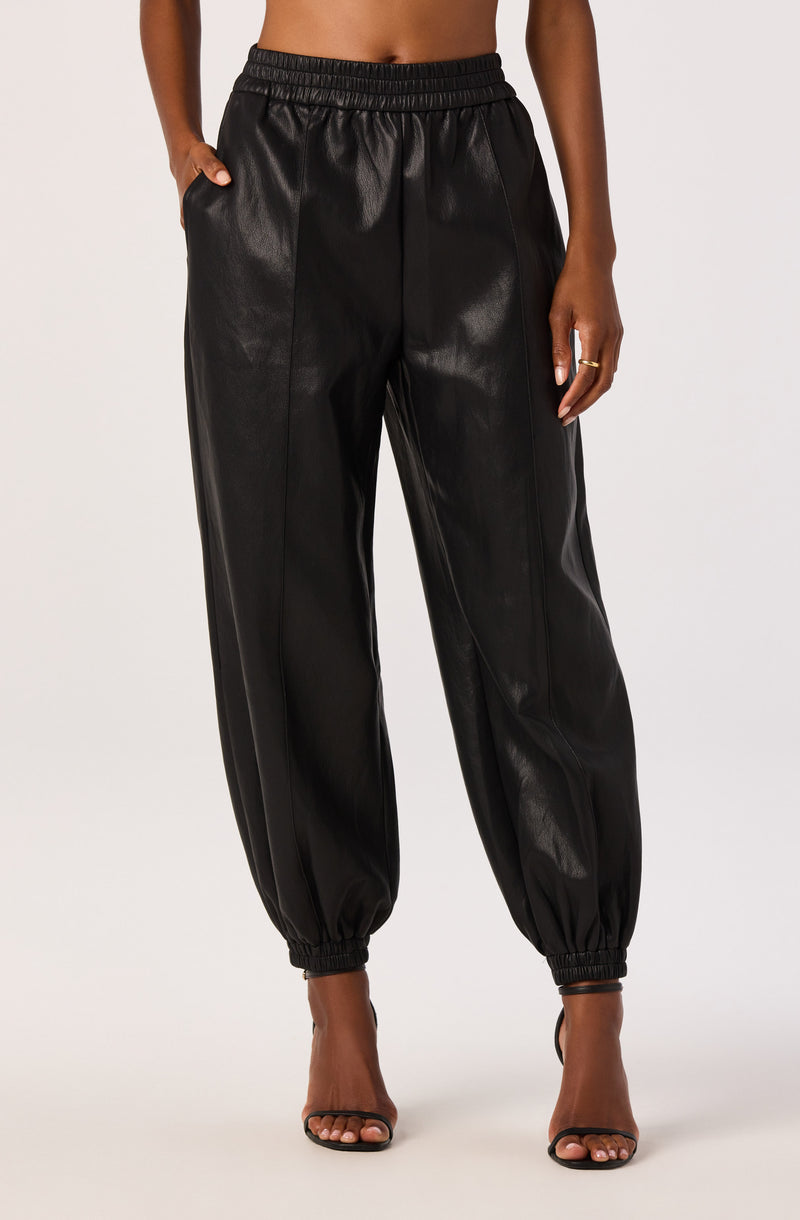 Black faux leather jogger pants with elastic waistband and ankle cuffs.