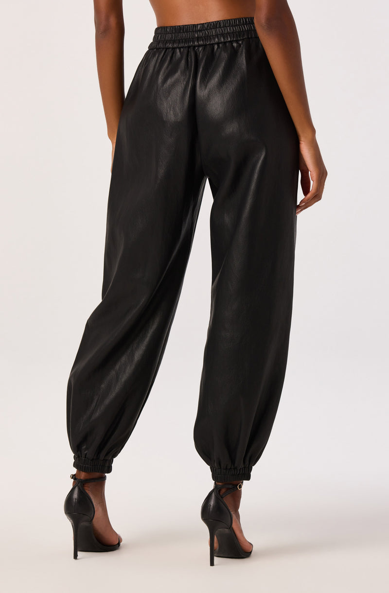 Black faux leather jogger pants with elastic waistband and cuffed ankles.